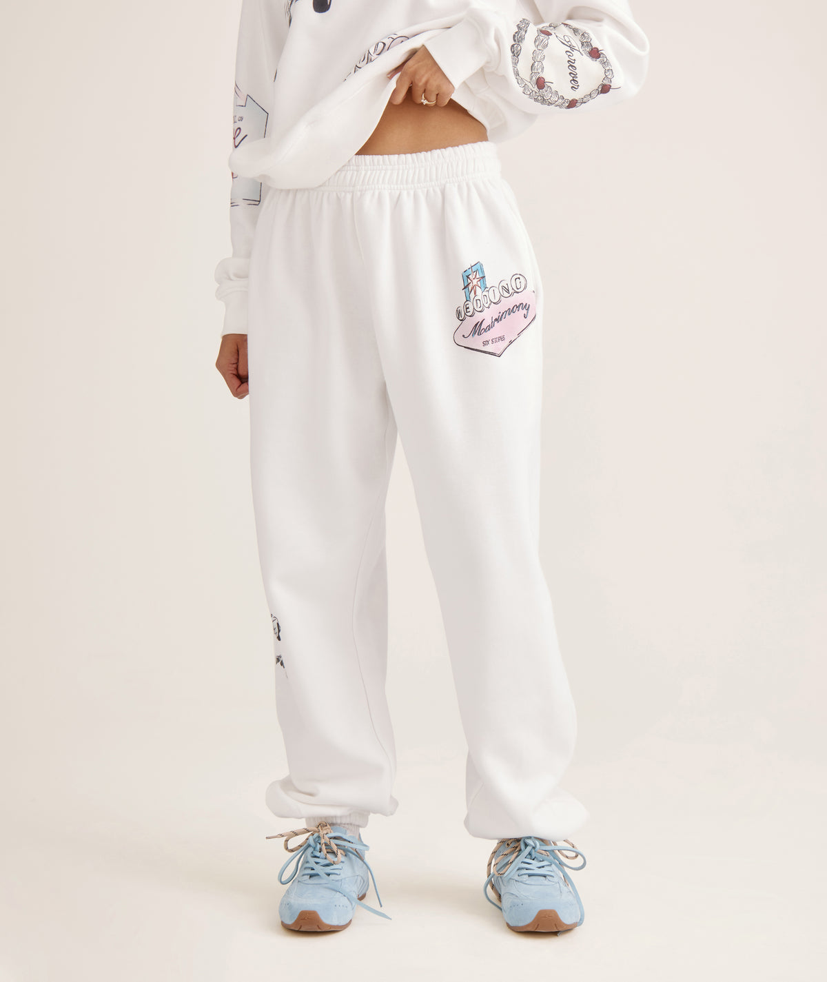 Vegas bachelorette sweatpants for bride – travel airport outfit in white