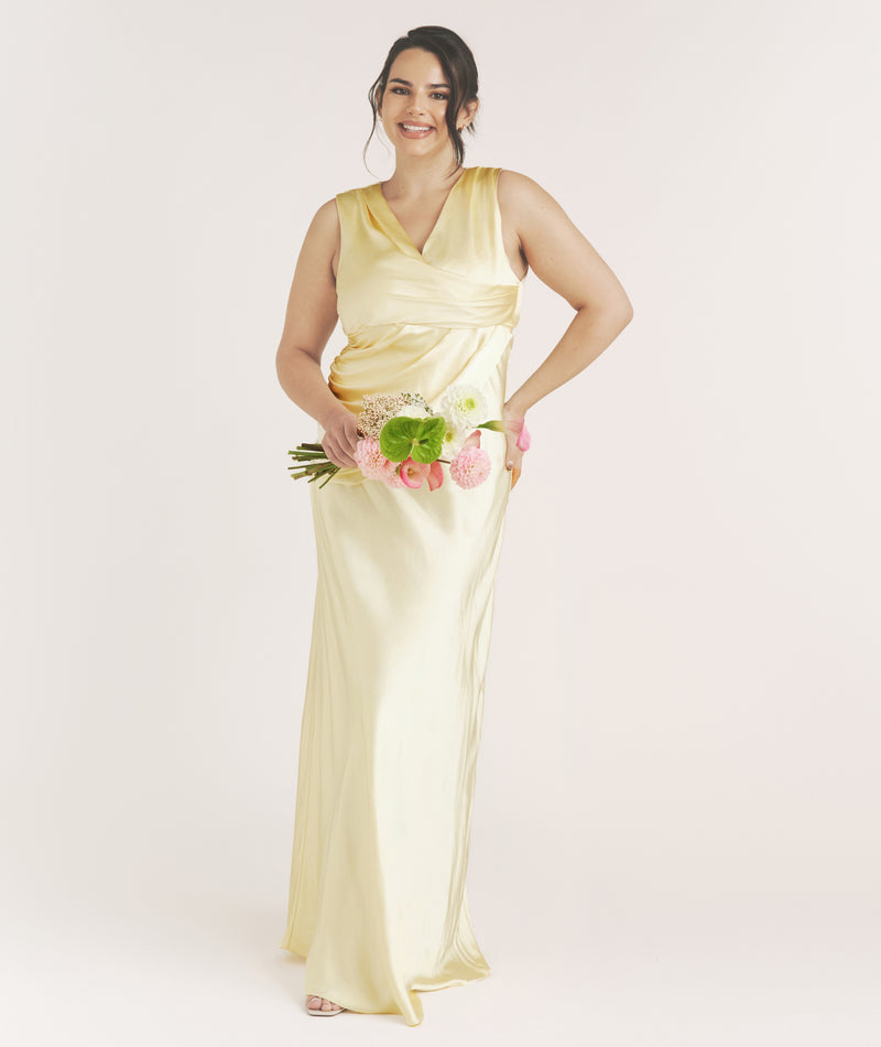 lemon bridesmaid dresses asos ASOS DESIGN Curve bridesmaids halter neck satin maxi dress with scarf detail in lemon