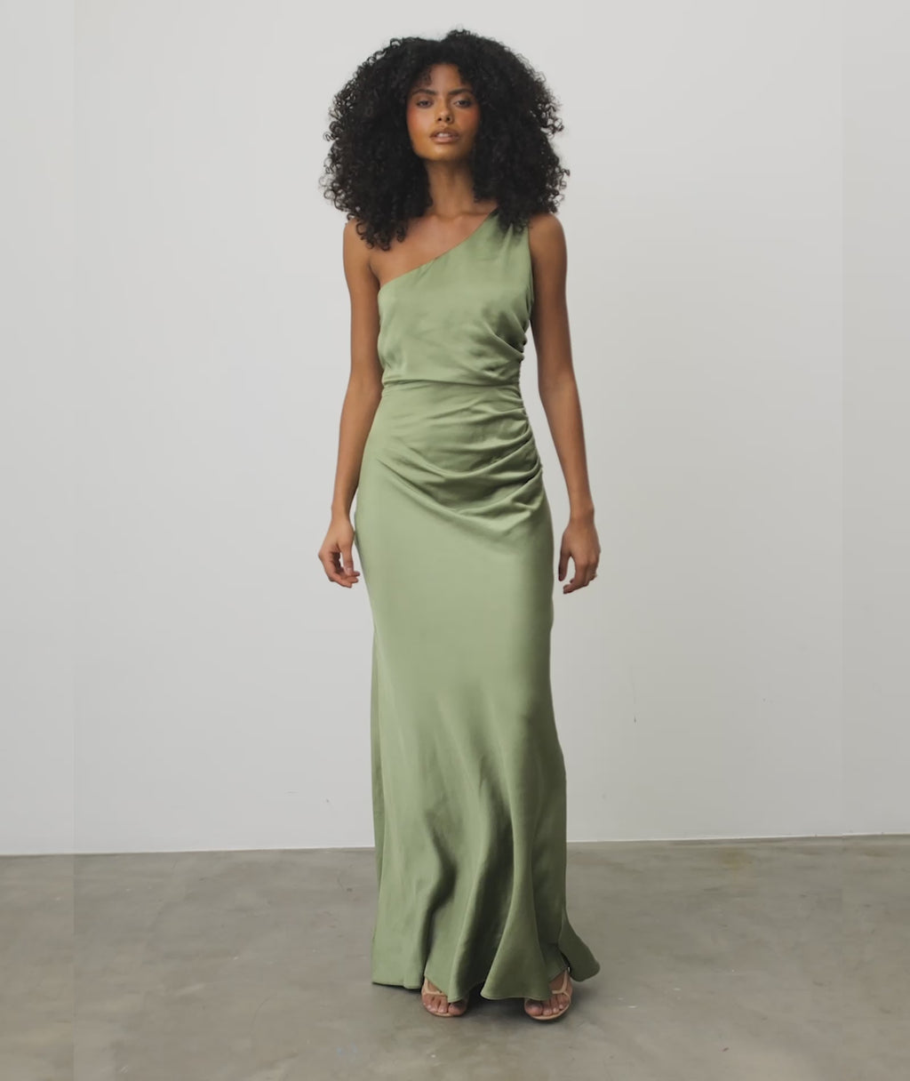 A stand-out one shoulder dress your bridesmaids can slip into and feel  unbelievable in. Revealing some skin, cinched at the waist to emphasise  their gorgeous figure with our most flattering silhouette. Luxurious