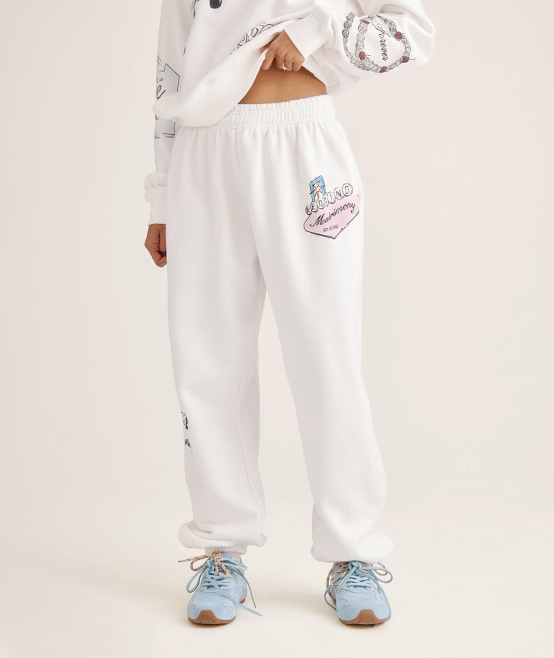 Vegas bachelorette sweatpants for bride – travel airport outfit in white